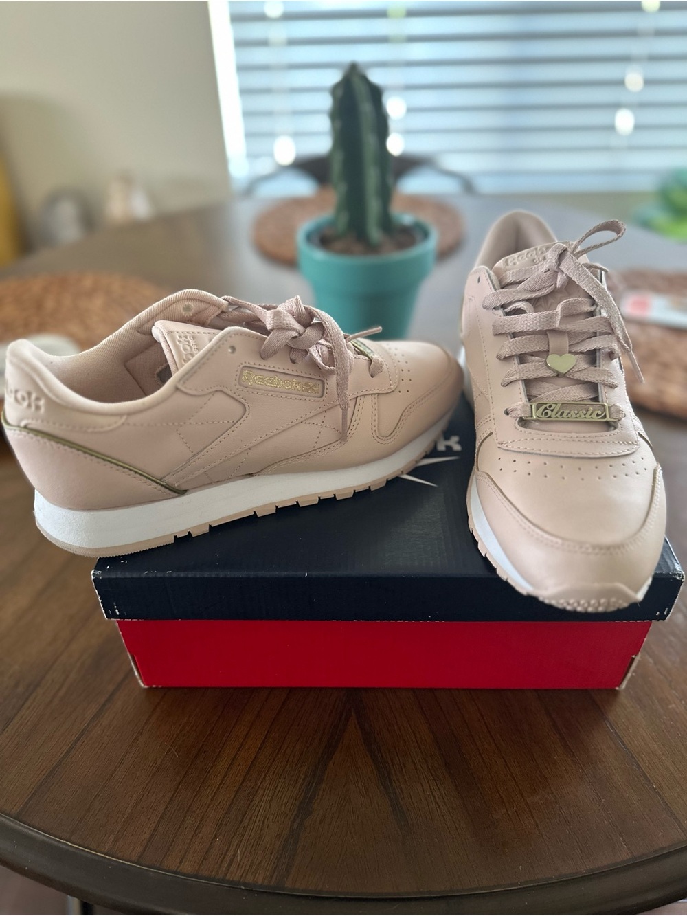 Reebok Women's Sneakers in Blush Pink with Gold Accents